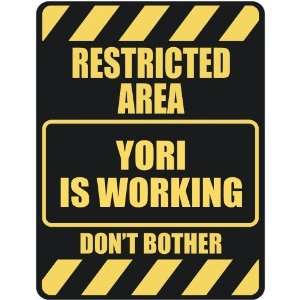   RESTRICTED AREA YORI IS WORKING  PARKING SIGN