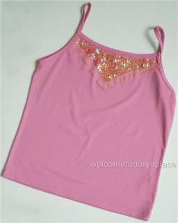   Pink Fling tank top features sparkly sequin on mesh triangle. Perfect
