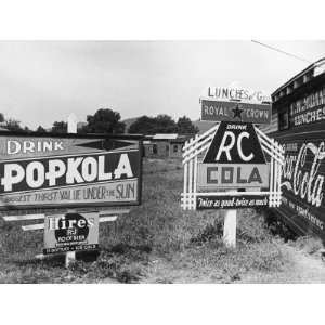  Signs Advertising Various Types of Beverages Including RC 