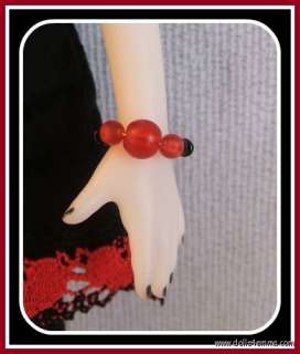 red round frosted acrylic beads and red round glass beads.