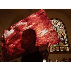  A Man Holds a Pane of Stained Glass with Nanoparticles of 