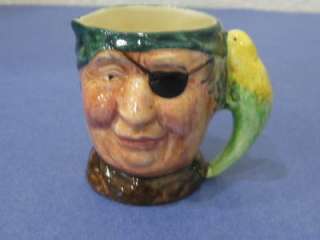 Made in England small size, creamer mug 2.5 tall Parrot bird handle