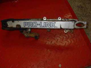 This is a used Swing arm from a 1985 Honda XR80 R . This will work on 