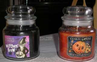   HALLOWEEN ORANGE AND BLACK CANDY CORN AND WITCHES BREW JAR CANDLES