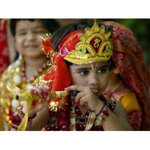 A Child Enacts the Life of Hindu God Krishna During 