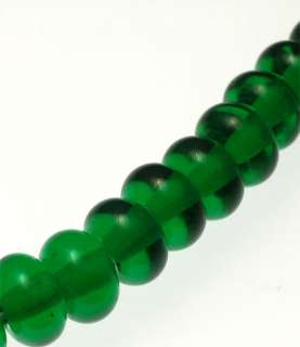   for 20 dark green lampwork spacer beads. They are approx. 8mm by 5mm