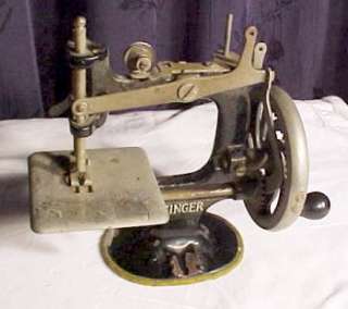 Antique Singer toy sewing machine early 1900s  