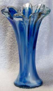 VINTAGE CLEAR, COBALT BLUE AND WHITE SLAG VASE. 7 3/4 INCHES TALL 