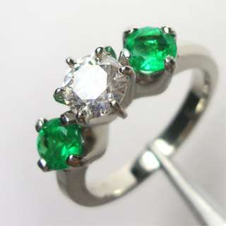   natural vibrant green Colombian emeralds and scintillating diamond