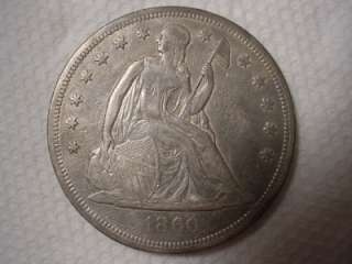 1860 O LIBERTY SEATED DOLLAR  