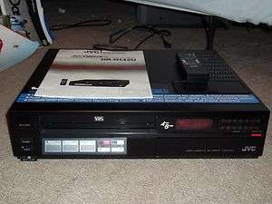 JVC HR D142U VIDSTAR 4 HEAD VHS VCR WITH REMOTE AND MANUALINVEST IN 