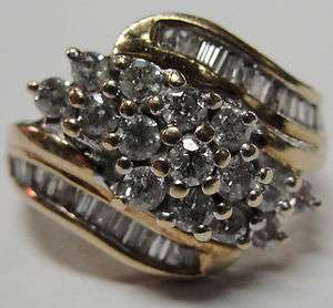 Ladies 10k Gold Diamond cluster ring aprox 1.0 CT  