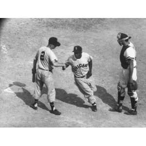 White Sox Player Nellie Fox at Home Plate, Shaking Hands with Minnie 