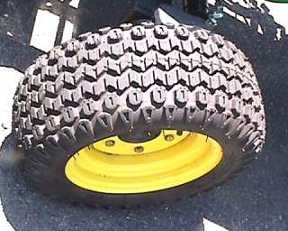 The photo above shows this tire installed on a new JD 4WD sub compact 