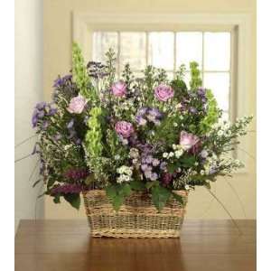   Roses, Bells of Ireland and Purple Monte Cassino Spray Aster in Basket